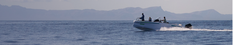 Actor portrayal of two people on a speed boat on a lake