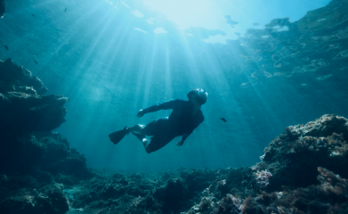 Actor portrayal on an adult male scuba diving