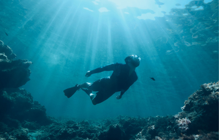 Actor portrayal on an adult male scuba diving
